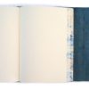 Blank notebook with marbled edges and a blue cover, perfect for journaling or creative writing.