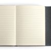 Blank notebook with cream-lined pages and a black textured cover from The Wraperie.