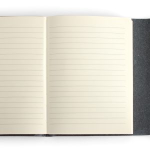 Blank notebook with cream-lined pages and a black textured cover from The Wraperie.