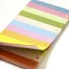 Colorful to-do list sticky notes with pastel stripes and polka dots, ideal for organizing tasks and planning at The Wraperie.