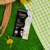 Brightly colored Happy Planner sticker sheet with fun ice cream and summer-themed designs on a green checkered picnic blanket. Perfect for customizing planners and adding cheerful decorations.