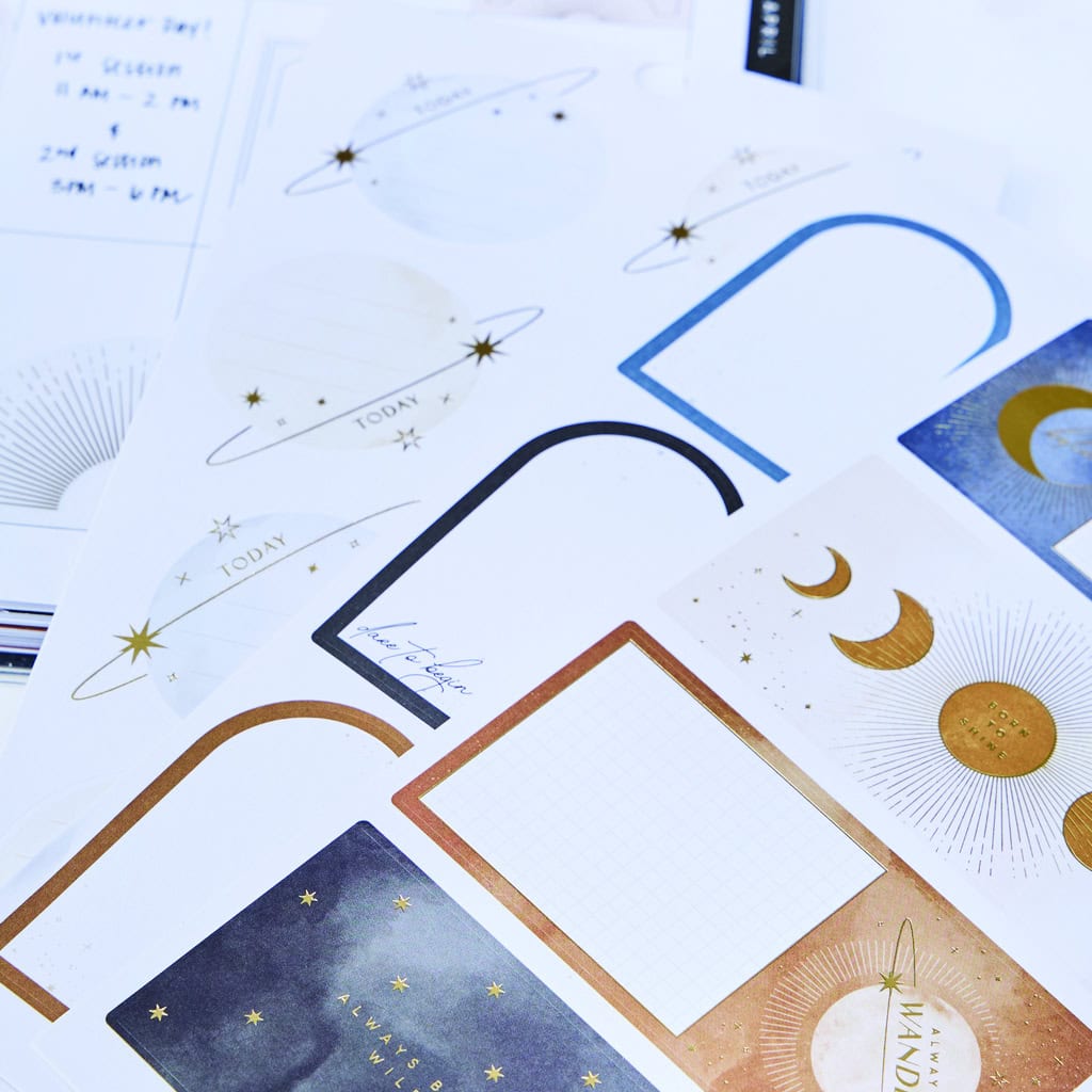 Planner and journal planner designs with moon, star, and celestial themes, perfect for organization, goal setting, and journaling at The Wraperie. Beautiful stationery for mindful planning.