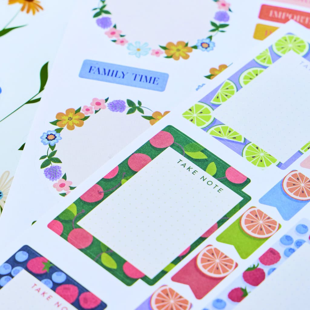 Colorful floral and fruit-themed stationery set from The Wraperie, featuring reminder notes, note pads, and themed designs for organization, gifting, and journaling enthusiasts.