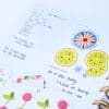 Colorful planner pages with motivational and organizational notes, floral and citrus-themed stickers, designed for effective daily planning and stress relief.
