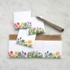 Bright botanical-themed stationery featuring pressed flowers and greenery, perfect for custom gift tags, labels, and decorative accents. Sustainable and handcrafted from eco-friendly materials.