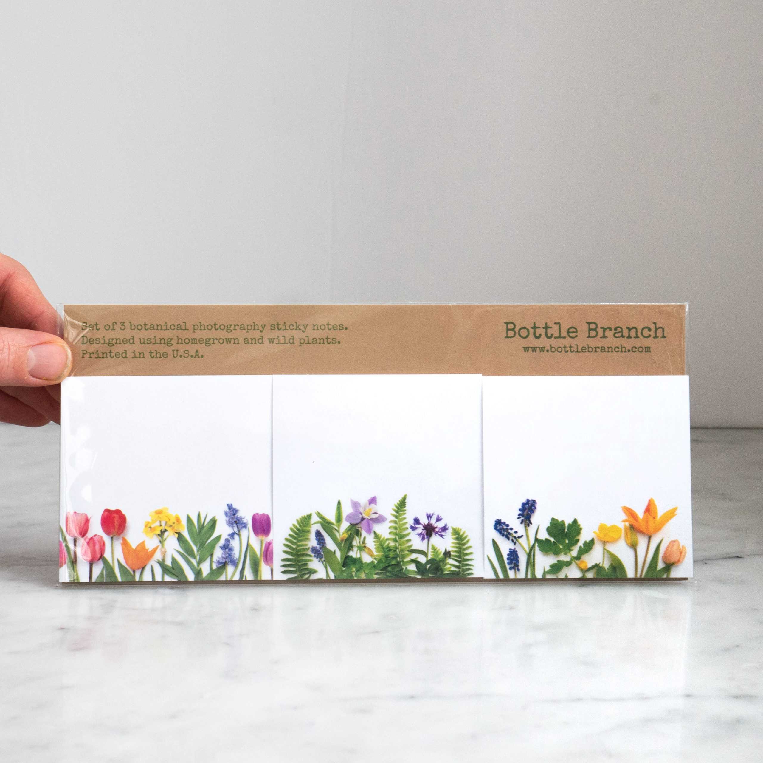 Colorful botanical photography sticky notes with flower and plant illustrations, designed using wild and homegrown plants, ideal for nature-inspired stationery collections.