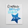 Colorful handmade card with words "Completely Amazingly Brilliant Son" and a blue star, celebrating a son's uniqueness and brilliance. Perfect for Father's Day, birthdays, or special occasions.