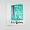 One whole year on planet Earth birthday card with colorful design and playful character, perfect for celebrating a child's first birthday or milestones on the journey of life.