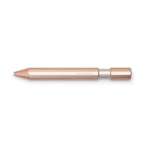 Shimmery rose gold lip crayon by The Wraperie, a versatile makeup product for lip color and contouring, sleek metallic design, perfect for on-the-go beauty applications.