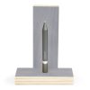 Sustainable gray pen displayed on a wooden stand, eco-friendly stationery product for note-taking and writing. Perfect for environmentally conscious office supplies or creative projects.