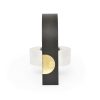 Ultra-thin black tape dispenser with gold accent for packaging and wrapping needs.