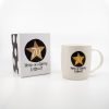 Celebration mug and gift box commemorating 70 years of a living legend with bold star design and personalized message. Perfect for milestone birthdays and special occasions.