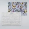 Colorful floral and butterfly-themed recipe and shopping list stationery set from The Wraperie, perfect for organizing recipes and grocery shopping in a stylish pattern.