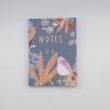 Colorful notepad with floral and bird design, perfect for note-taking and journaling, available at The Wraperie. Elegant stationery for everyday use and gift-giving.
