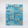 Colorful birthday gift bag with celebration-themed words in blue, gold, and navy, perfect for parties, birthdays, and special occasions, from The Wraperie.