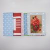 Colorful gift card boxes with floral and polka dot designs perfect for special occasions at The Wraperie.