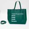 Designer tote bag in vibrant green with bold white text featuring luxury fashion brands and playful Italian phrase, perfect for stylish outings and fashion enthusiasts.