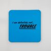 I am definitely not trouble sign on blue square wall art.