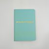 #makeithappen motivational notebook with pastel blue cover for goal setting and inspiration.