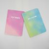 Task owner task and idea creator notebooks with pastel pink, green, and blue colors for creative planning and productivity.