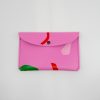 Vibrant pink food wrap wallet featuring abstract colorful patterns for eco-friendly, stylish, reusable food storage accessories. Perfect for snacks, sandwiches, and lunch on-the-go.