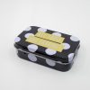 Polka dot black and white tin box with a quote, Creative gift container, The Wraperie, stylish storage solution, unique themed keepsake box, decorative party favor.