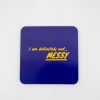 Messy coaster with yellow text "I am definitely not... MESSY" on a blue background, stylish drinkware accessory, trendy coaster for home or bar, minimalistic design, popular for lifestyle and decor, The Wraperie product image.