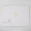 Bright white box featuring Archer & Olive's acyclic watercolor and acrylic marker collection for creative professionals. Perfect for dark surface work and artistic projects.
