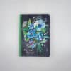 Colorful floral-themed notebook with 