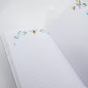 Colorful floral and bee-themed journal pages with lined writing space for notes, recipes, or daily journaling at The Wraperie. Perfect for organizing your ideas creatively.