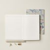 Elegant marbled notebooks with lined pages and stylish accessories, perfect for journaling or note-taking at The Wraperie. Ideal for creative, artistic, or professional use.