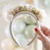 Elegant white flowered headband with 