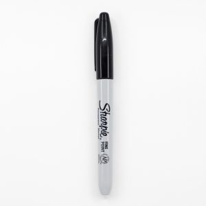 Black and white Sharpie marker for writing and arts and crafts.