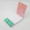 Vibrant pink and green custom snack boxes with stylish patterns, ideal for food presentation and branding at The Wraperie. Perfect for creative catering or retail packaging solutions.