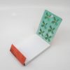Mini notepad with a green four-leaf clover design on the inside cover, perfect for jotting down quick notes and adding a touch of luck to your day.