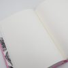 Blank notebook with white pages, minimalistic journal for notes or doodles, blank open sketchbook, creative writing or journaling space, product image from The Wraperie for stationery lovers.