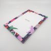 Brightly decorated notepad with colorful jungle animal illustrations, perfect for notes and reminders, ideal for stylish office or home use.
