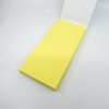 Bright yellow sticky notes on white background for organization and note-taking.
