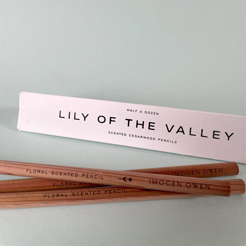 Lily of the Valley scented cedarwood pencils from The Wraperie, eco-friendly writing tools with floral fragrance, perfect for gift sets or personal use, beautifully packaged.