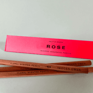 Rose-scented cedarwood pencils, natural wooden floral pencils, eco-friendly scented pencils for writing or gifting, The Wraperie product, premium quality stationery.