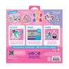 Bright pink and purple unicorn-themed craft kit featuring colorful shrinkable plastic charms, mini cords, and instructions for boys and girls to create fun jewelry and accessories.