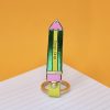 Pencil-shaped ring holder with "Stay Sharp" message, colorful accessory, creative desk decor, stylish jewelry organizer, fun stationery design for students and professionals alike.