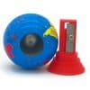 Colorful world globe with a red pencil sharpener, educational desk accessory, perfect for children learning geography, artistic school supplies, and creative classroom tools.