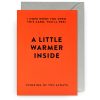 A greeting card with bright orange background and black bold text that says "A Little Warmer Inside", perfect for expressing warmth and thoughtful sentiments. Ideal for gift shops or personalized occasion cards.