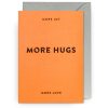 Bright orange greeting card with "More Hugs" message, perfect for expressing love and affection, accompanied by an envelope, ideal for special occasions or heartfelt notes.