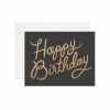 Happy Birthday greeting card with black background and gold handwritten-style text on white envelope, perfect for celebrating special occasions with personalized messages.