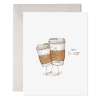 Coffee cups with funny faces and arms, holding hands, with the text "You're so hot" on a greeting card from The Wraperie.