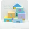 Colorful children's birthday greeting card with building blocks spelling "BOY" and "GIRL" over a white background. Perfect for celebrating new bundles of joy with creative, vibrant designs.