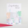 Beautiful congratulation greeting card featuring a cute illustration of a mother elephant with her twin calves surrounded by pastel-colored foliage, perfect for celebrating new twin arrivals.