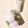 Refreshing citrus tonic candle with essential oils, soy wax, and elegant packaging for wellness and aromatherapy.